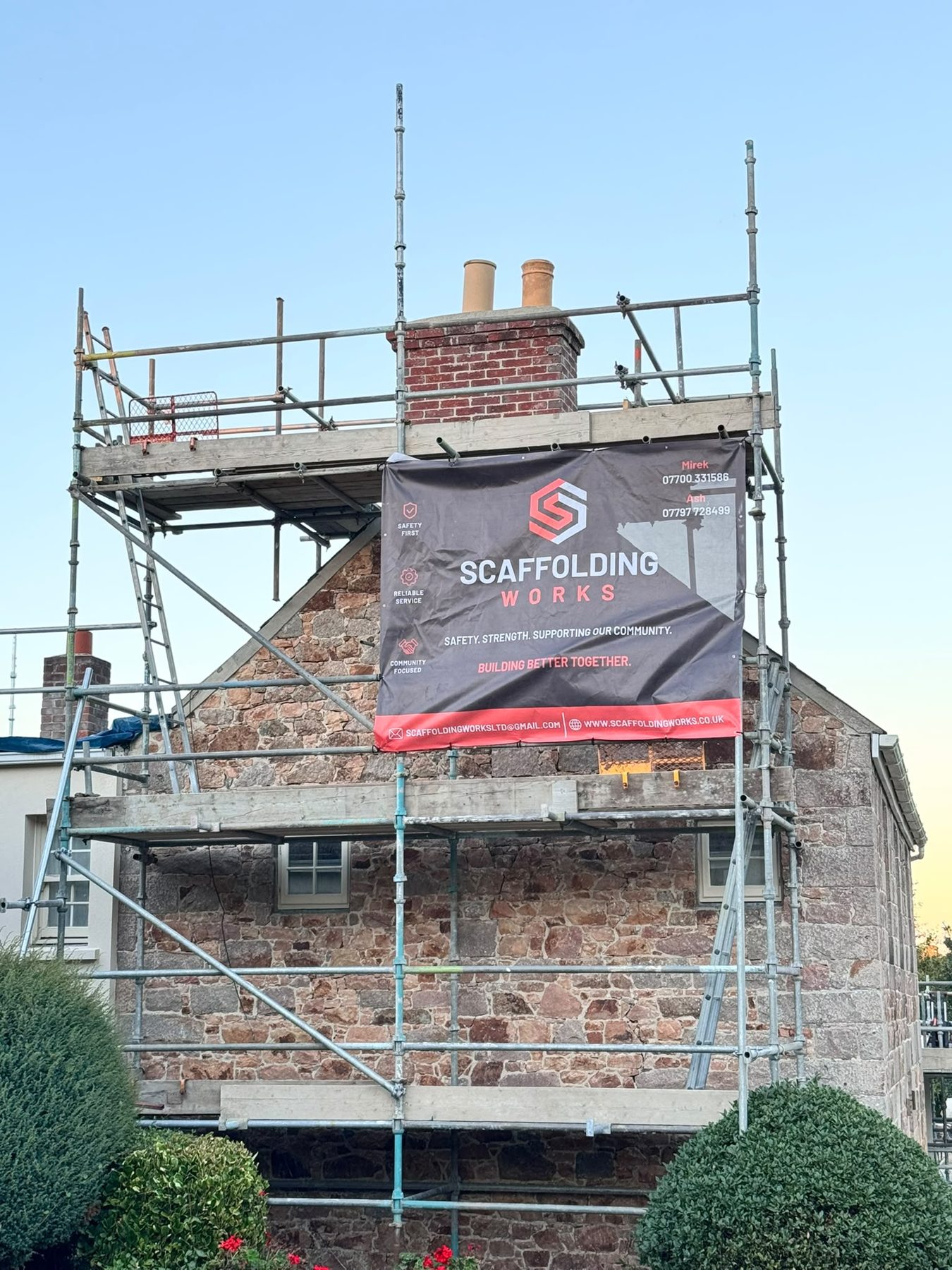 Scaffold around a house and chimney
